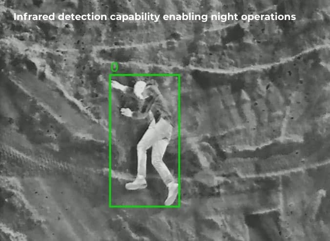 AIMS infrared view of a body on the ground at night