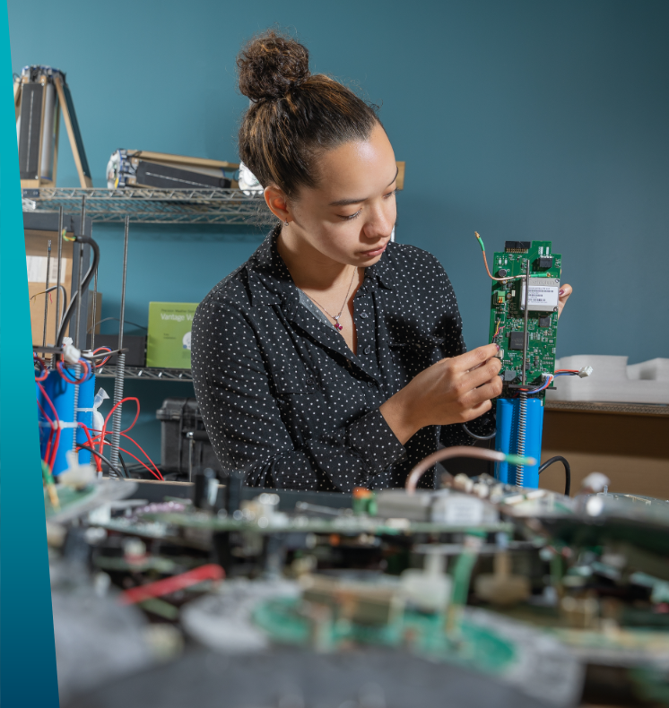 Technician working on a motherboard
